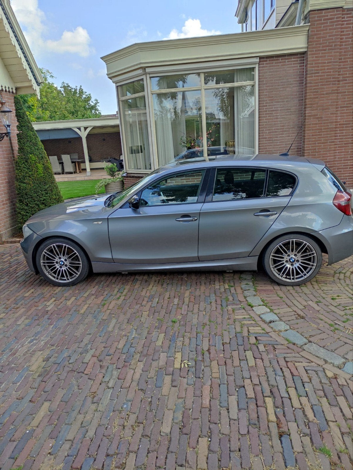 BMW 1-Serie 3.0  LCI bj 2011, Achterwielaandrijving, Zwart, 258 pk, 2996 cc