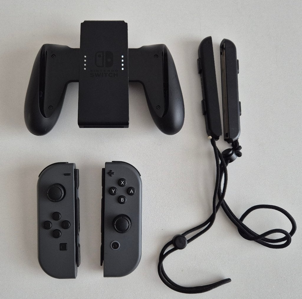 2 x Nintendo Switch Joy-Con Grijs + Joy-Con Grip, Ophalen of Verzenden, Gebruikt, Switch, Overige controllers