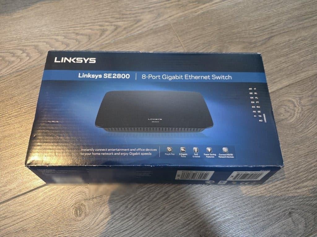 Linksys SE2800 8-poorts Gigabit switch, compleet in doos, Ophalen of Verzenden, Gebruikt