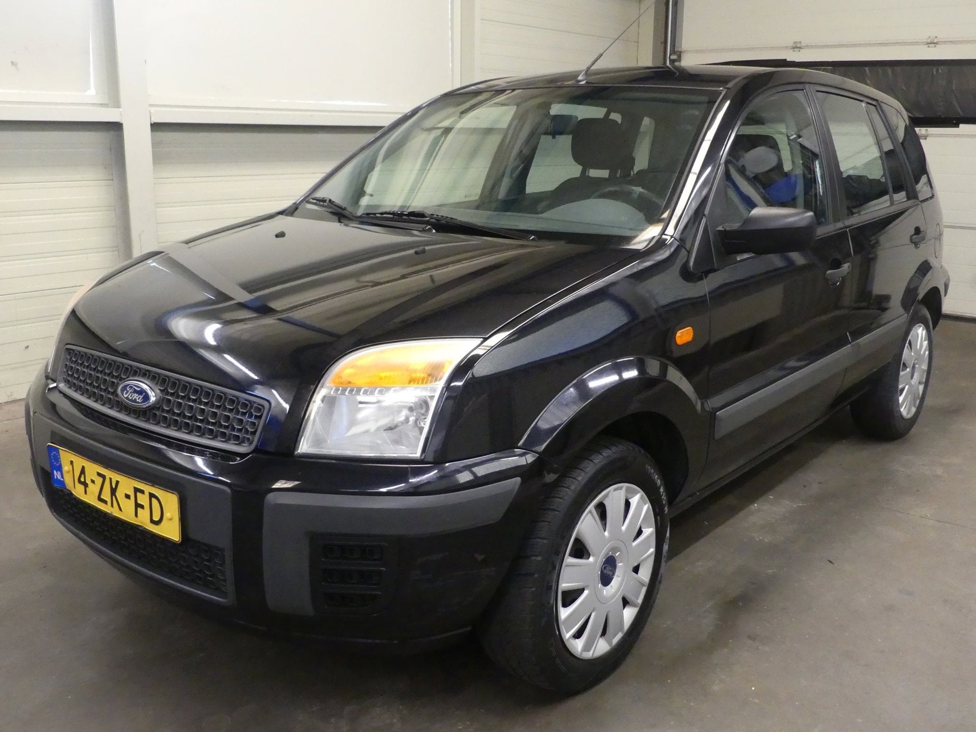 Ford Fusion 1.4-16V Cool & Sound - Trekhaak - Airco, Auto's, Voorwielaandrijving, Gebruikt, Zwart, Origineel Nederlands