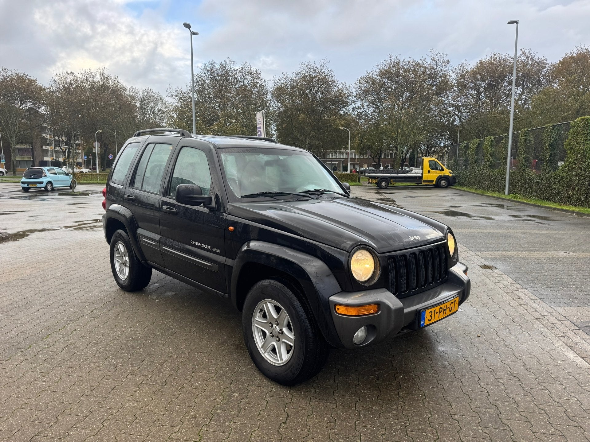 Jeep Cherokee 3.7i V6 Extreme Sport, Automaat, Gebruikt, 3360 kg, Leder en Stof