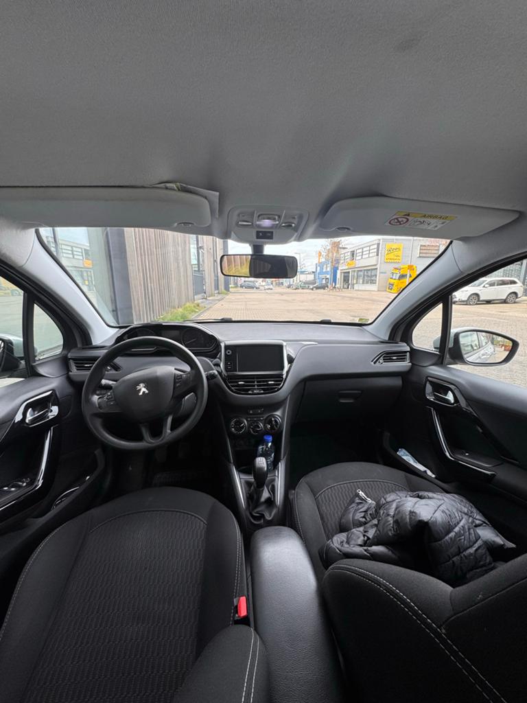 Peugeot 208 1.2 VTI 60KW/82PK 5-D 2017 Grijs, Auto's, Peugeot, Voorwielaandrijving, Stof, 23 km/l, Origineel Nederlands