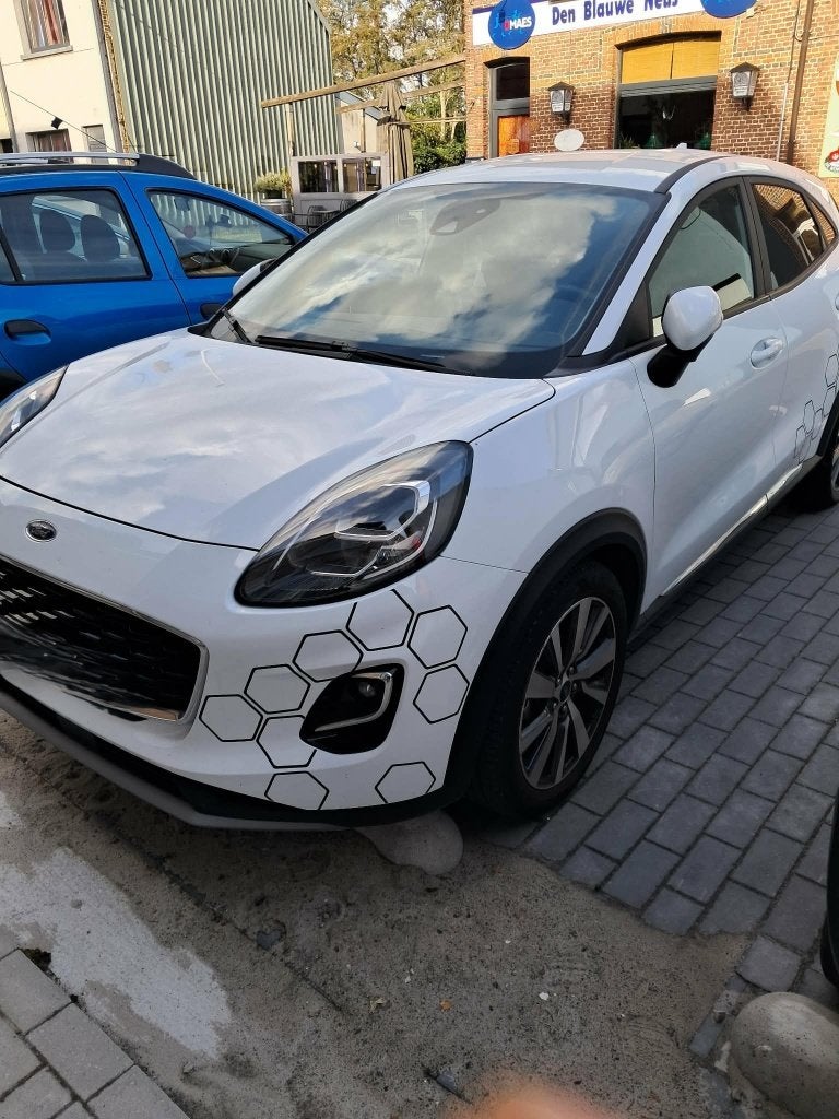 Ford Puma 2022 en 31000km, Auto's, Volkswagen, Voorwielaandrijving, 125 pk, Wit, Handgeschakeld
