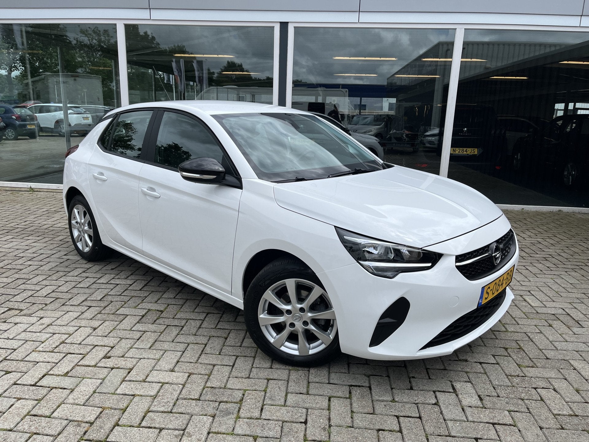 Opel Corsa 1.2 Edition Airco / LMV / Cruise / Carplay, Auto's, Voorwielaandrijving, Euro 6, 1199 cc, Wit