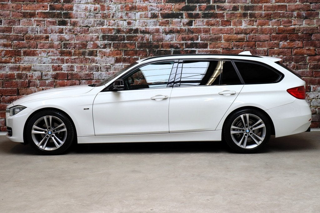 BMW 3 Serie Touring 316i High Executive Sport Line / Navigat, Auto's, BMW, Gebruikt, 4 cilinders, Wit, Handgeschakeld