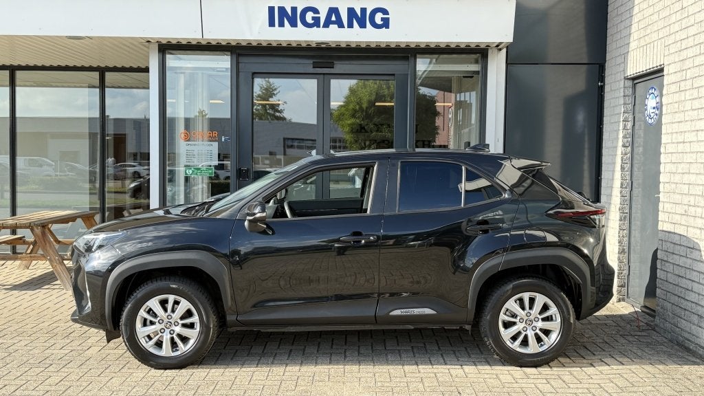 Toyota Yaris Cross 1.5 Hybrid Dynamic | Navi | Camera | Crui, Auto's, Stof, Gebruikt, 1490 cc, Bedrijf