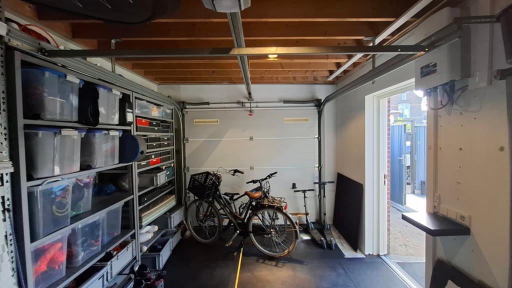 Automatische sectionale garagedeur met motor, Gebruikt, Garagedeur, Ophalen of Verzenden, Metaal