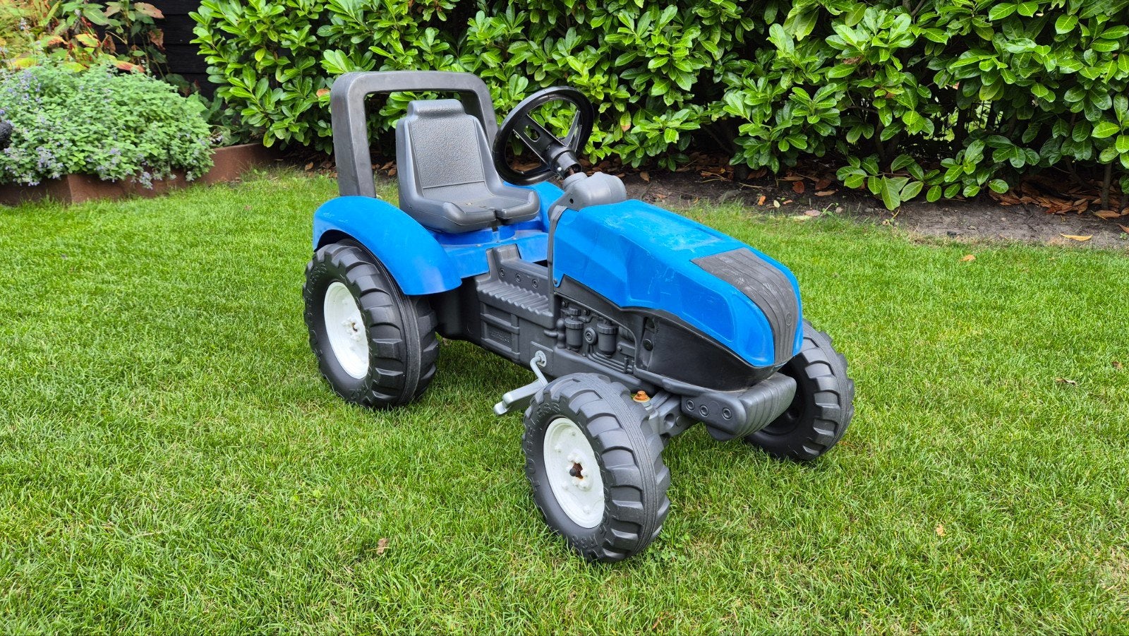 Blauwe 'New Holland' traptractor, Ophalen, Gebruikt, Trapvoertuig