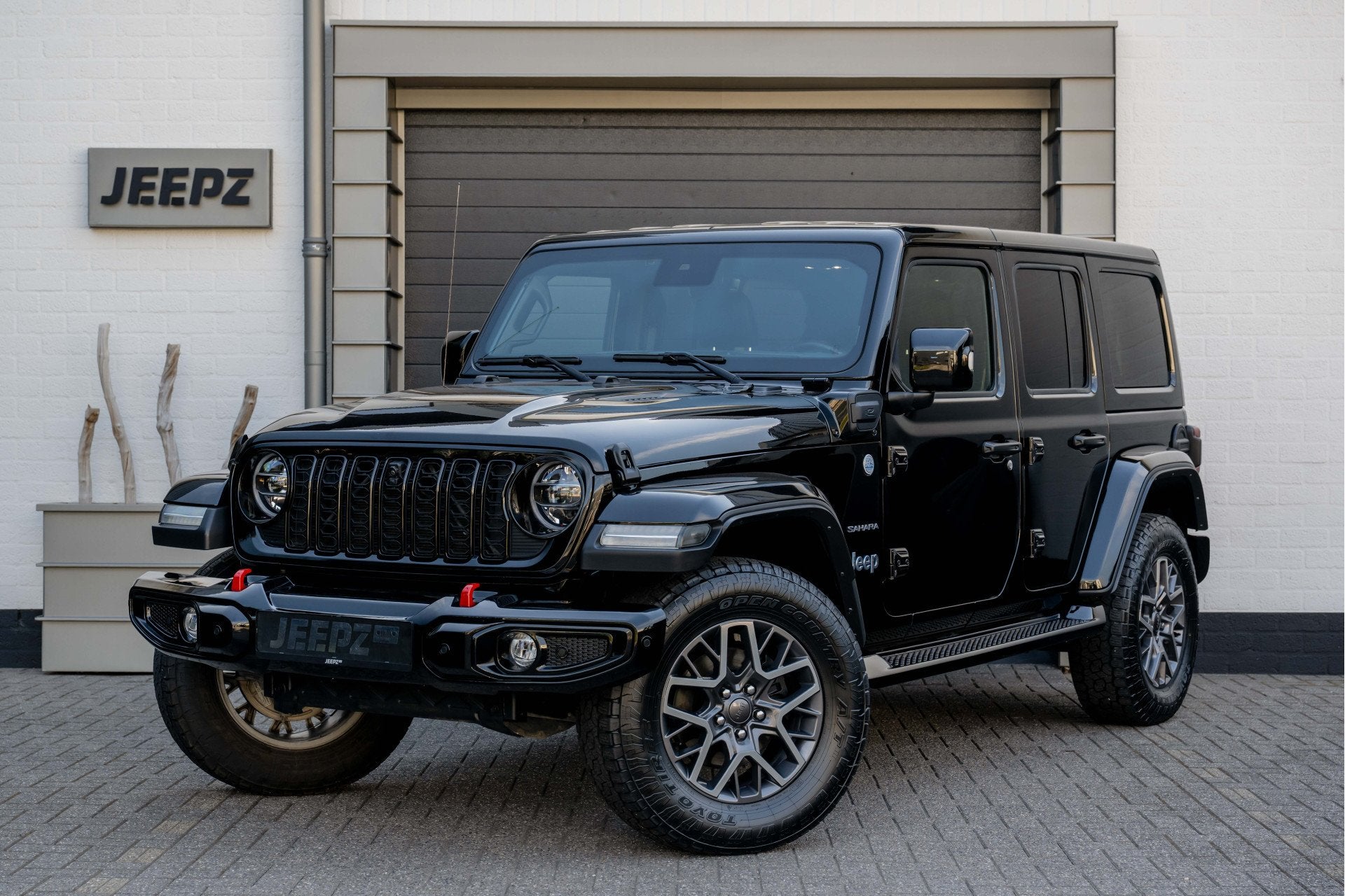 Jeep Wrangler Unlimited 4xe - Black Jeepz Edition (bj 2021), Automaat, Zwart, 4 cilinders, Cabriolet