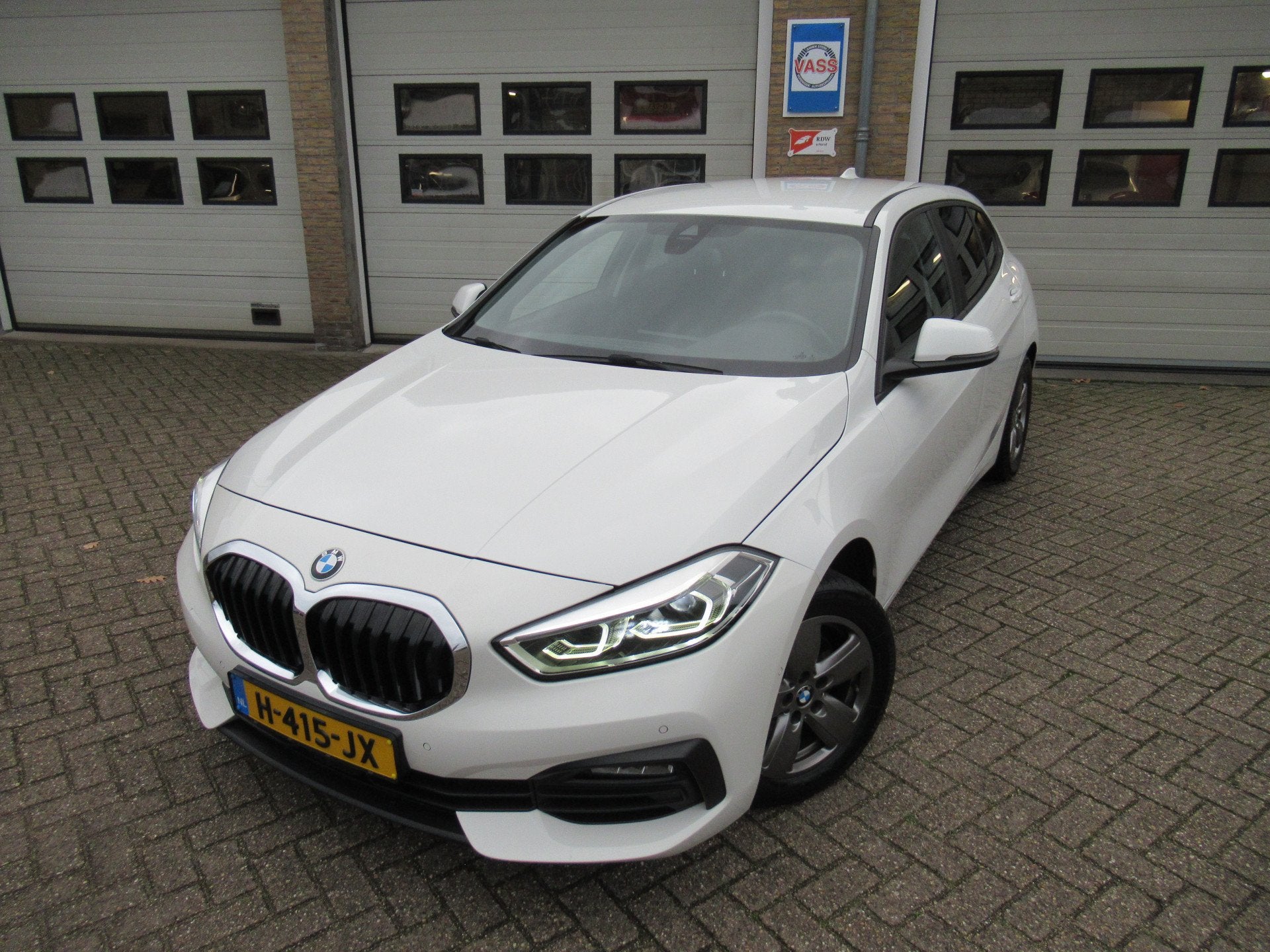 BMW 1-serie 118i Executive Edition (bj 2020, automaat), Gebruikt, Wit, Origineel Nederlands, Bedrijf