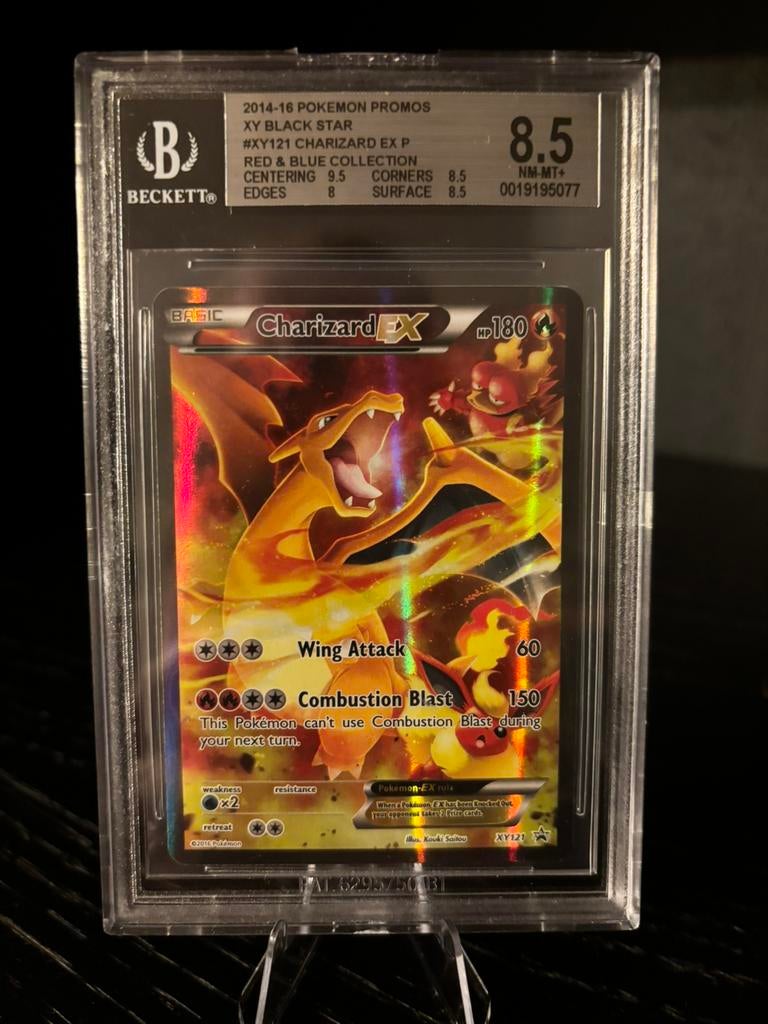 Charizard EX#XY 121 blackstar promo Beckett 8,5, Ophalen of Verzenden, Zo goed als nieuw