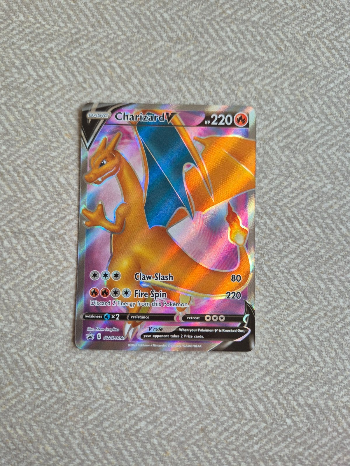 Charizard V SWSH050 Pokémon Kaart - Zo goed als nieuw, Ophalen of Verzenden, Zo goed als nieuw, Losse kaart, Foil