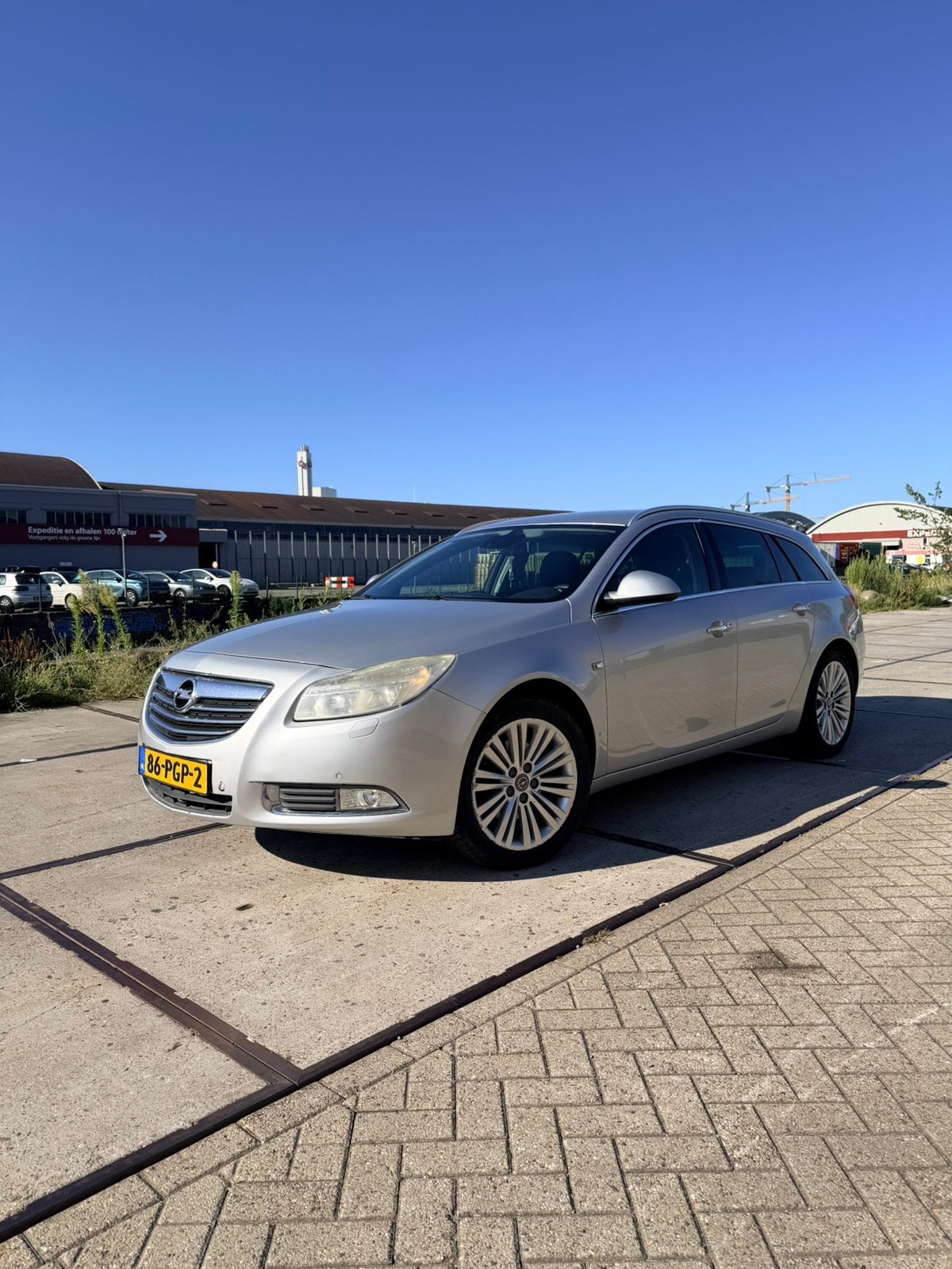 Opel Insignia 1.6 Turbo 132KW Sports Tourer 2011 Grijs, Auto's, Euro 5, Zwart, 4 cilinders, 179 pk