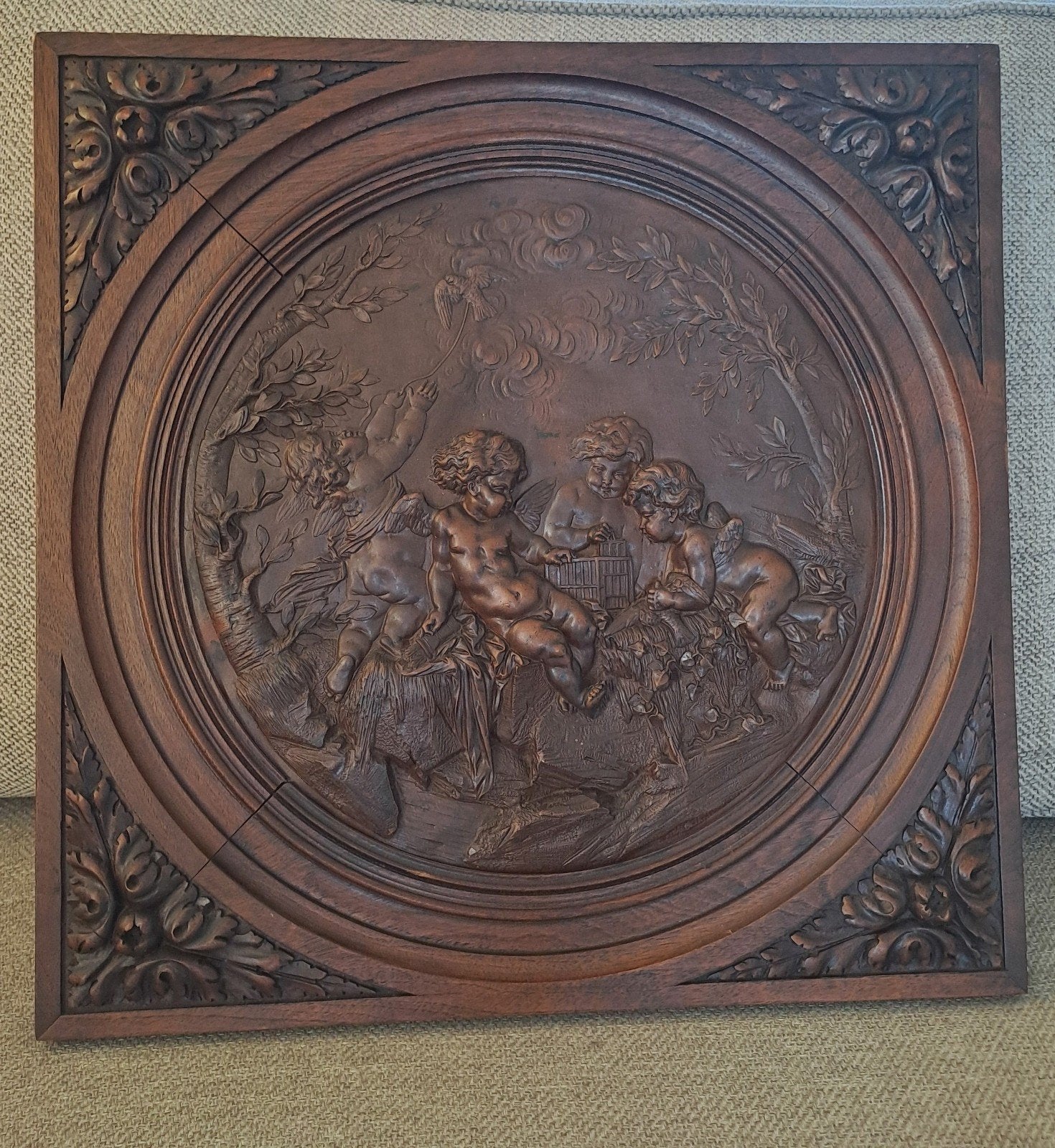 Bronzen plaquette putti, Ophalen