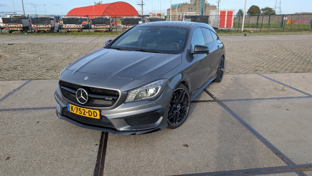 Mercedes-Benz CLA45 AMG 360pk 4MATIC DCT 2015 shooting brake, Auto's, Automaat, CLA, Zwart, 4 cilinders