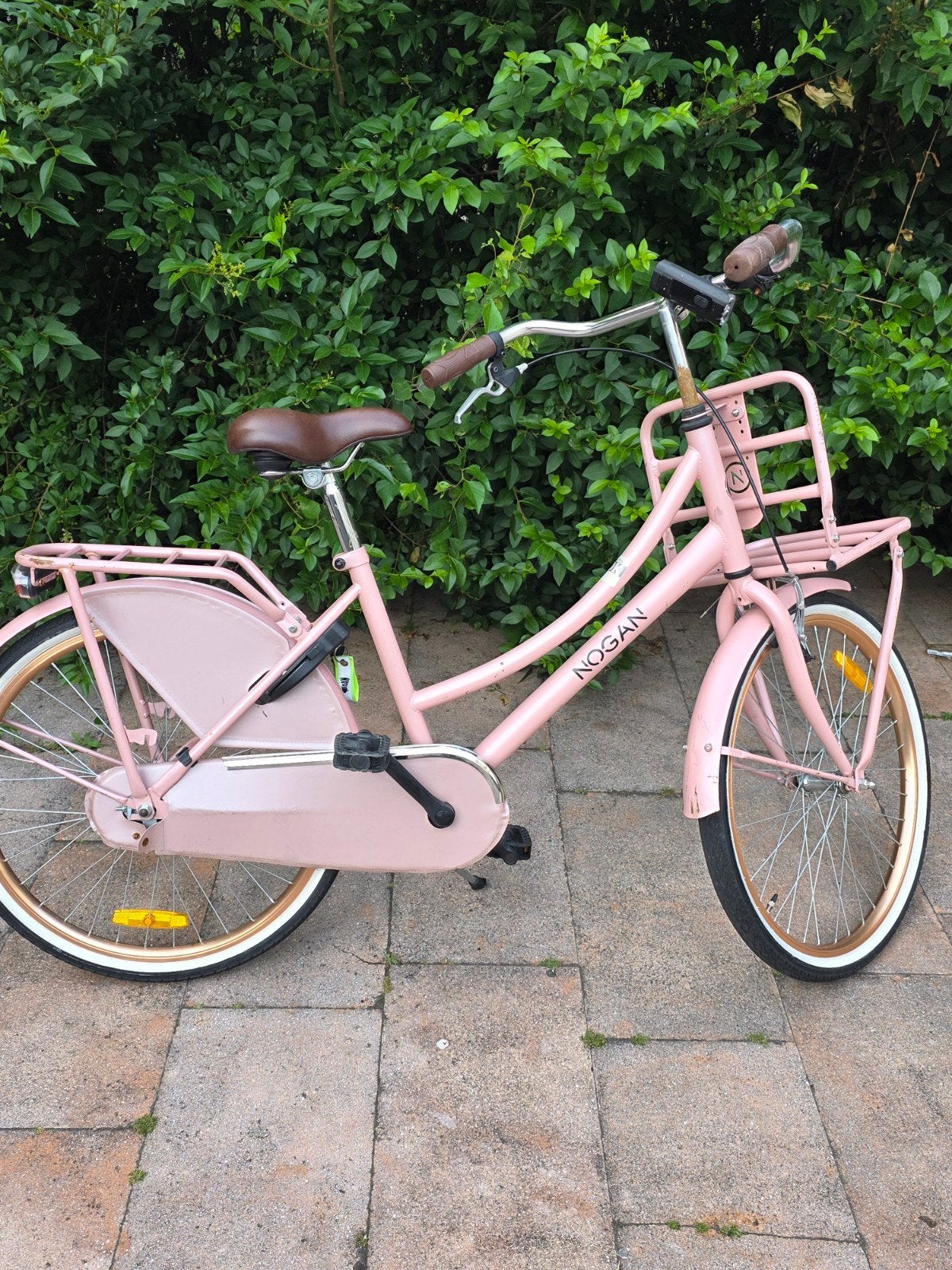 24 inch Nogan meisjes fiets Roze, Fietsen en Brommers, Overige merken, Gebruikt, Ophalen of Verzenden, Terugtraprem