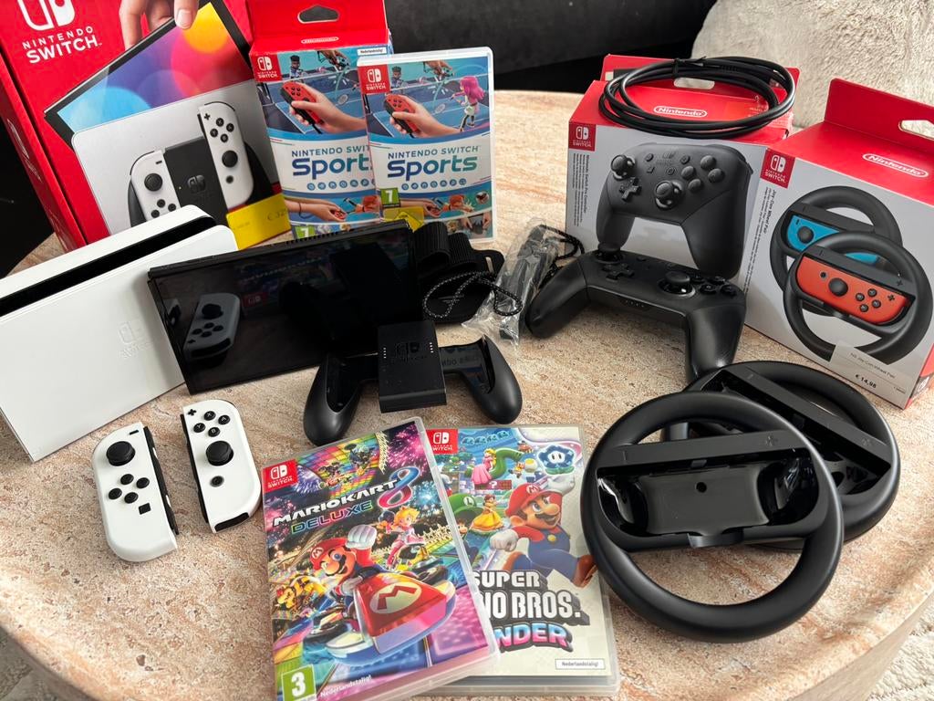 Nintendo Switch OLED Wit (Minder dan 6u speeltijd) + Games, Switch OLED, Met games, Met 2 controllers, Ophalen of Verzenden
