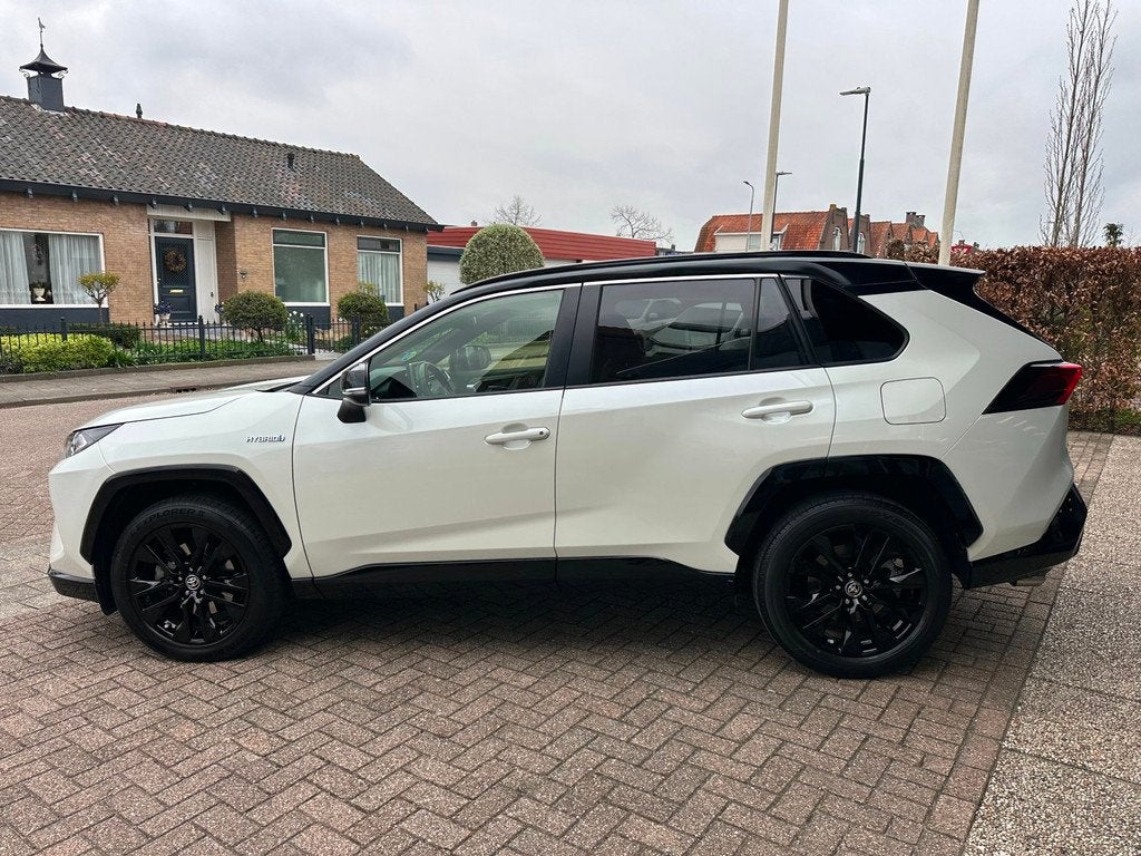 Toyota RAV4 2.5 Hybrid AWD Executive Bi-Tone|Leder|Apple Car, Auto's, Automaat, Gebruikt, 4 cilinders, 1650 kg