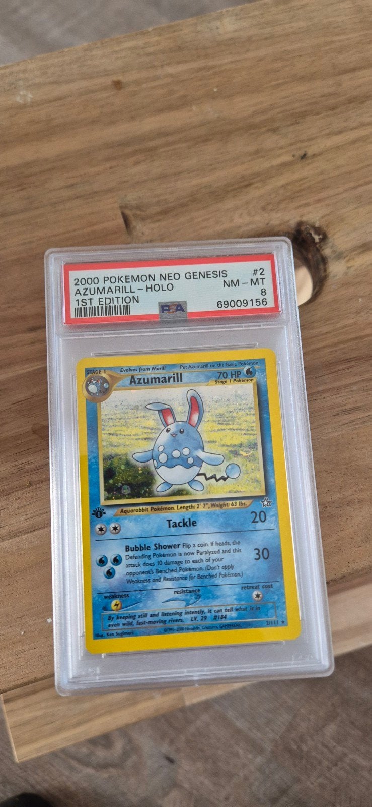 Azumarill Holo 1st Edition PSA 8 Neo Genesis Pokémon Kaart, Ophalen of Verzenden, Zo goed als nieuw, Losse kaart, Foil
