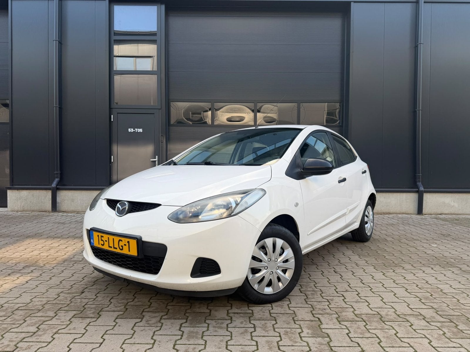 Mazda 2 1.3 55KW 5DRS 2010 Wit, Voorwielaandrijving, Stof, 74 pk, 4 cilinders