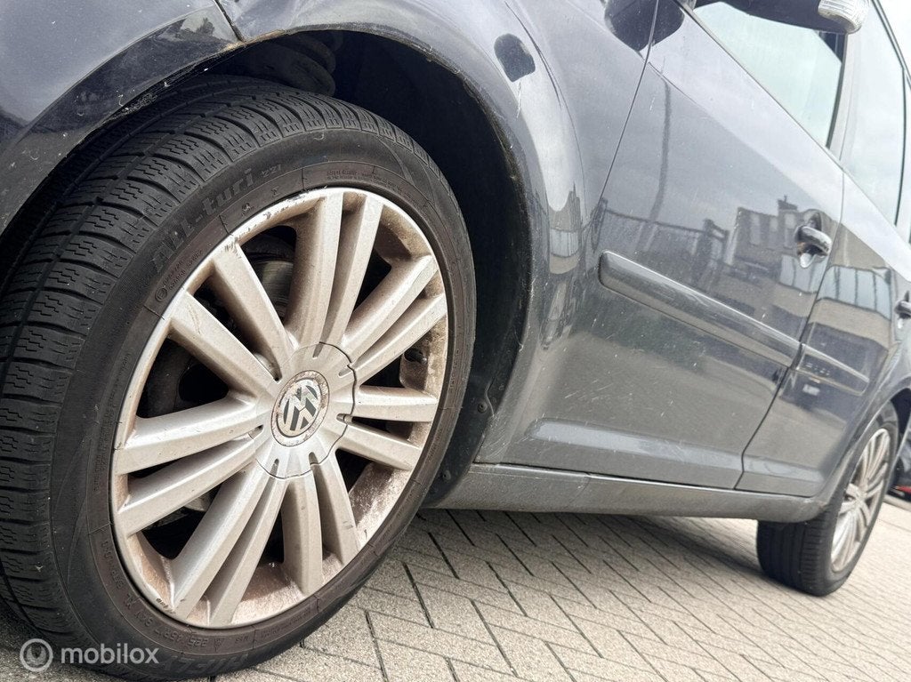 Volkswagen Touran 2.0-16V FSI Highline, Auto's, Volkswagen, Gebruikt, 4 cilinders, Zwart, Bedrijf