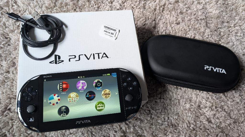 Sony Playstation Vita Slim met doos + SD Adapter & Case, Ophalen of Verzenden, Zo goed als nieuw, Zwart