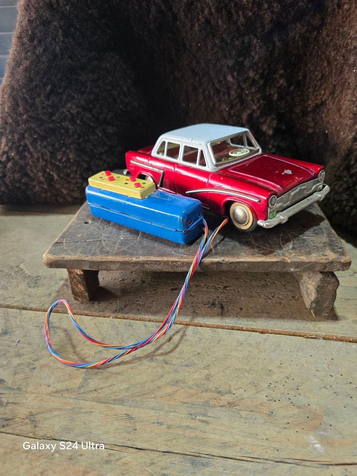 E13 > Vintage blikken modelauto met kabelbesturing,, Ophalen of Verzenden