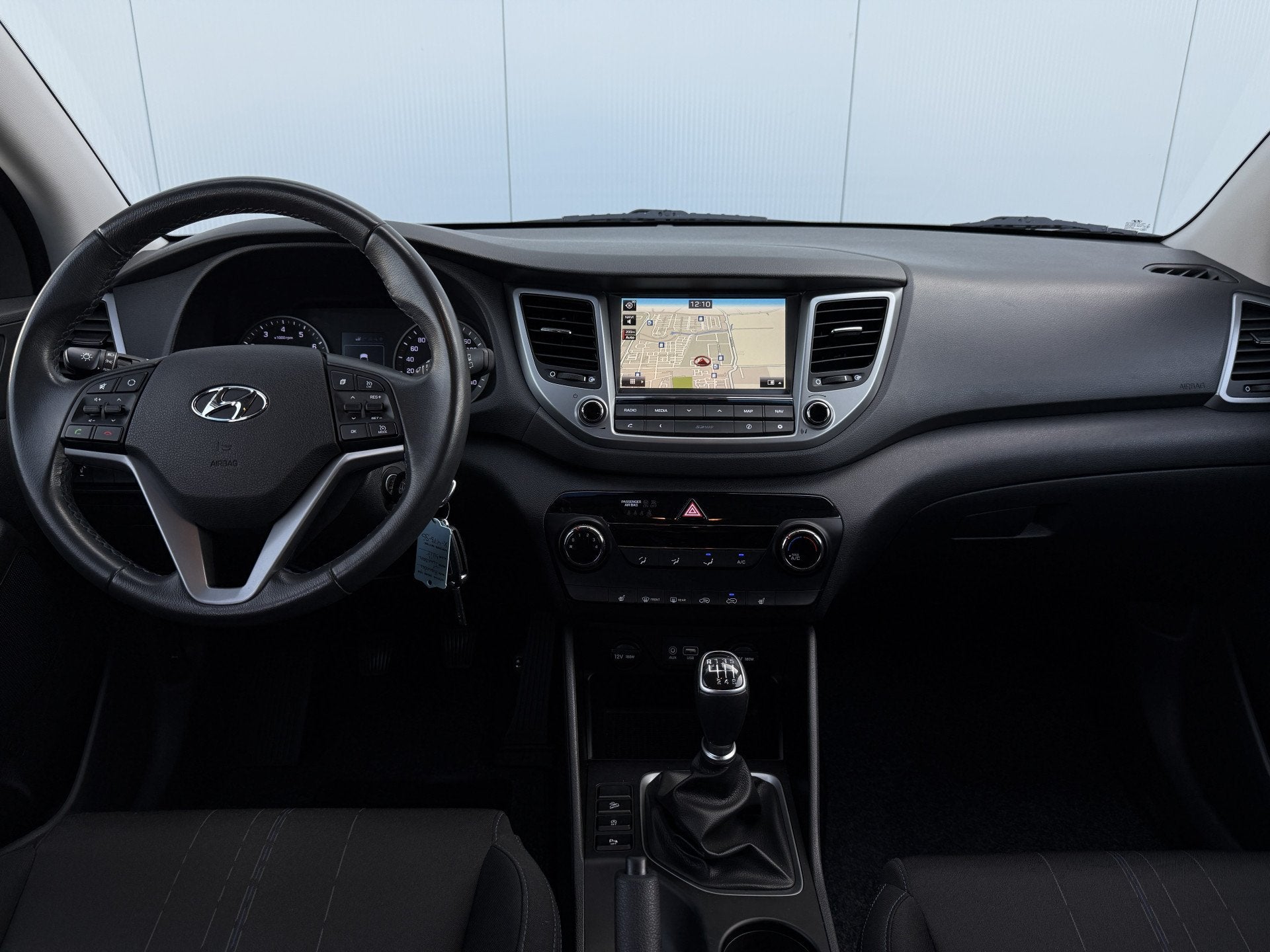 Hyundai Tucson 1.6 GDi i-Drive Trekhaak/Navi/Camera., Stof, Gebruikt, 4 cilinders, Grijs