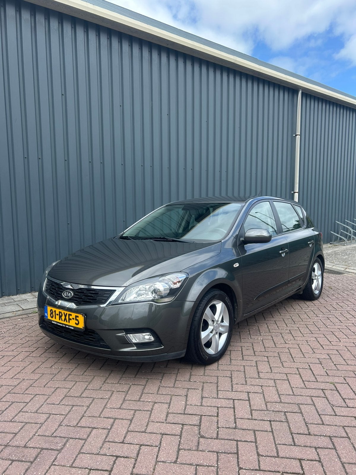 Kia Cee'd 1.4 Cvvt 2011 Grijs, Auto's, Kia, 4 cilinders, 1396 cc, Origineel Nederlands, 1200 kg