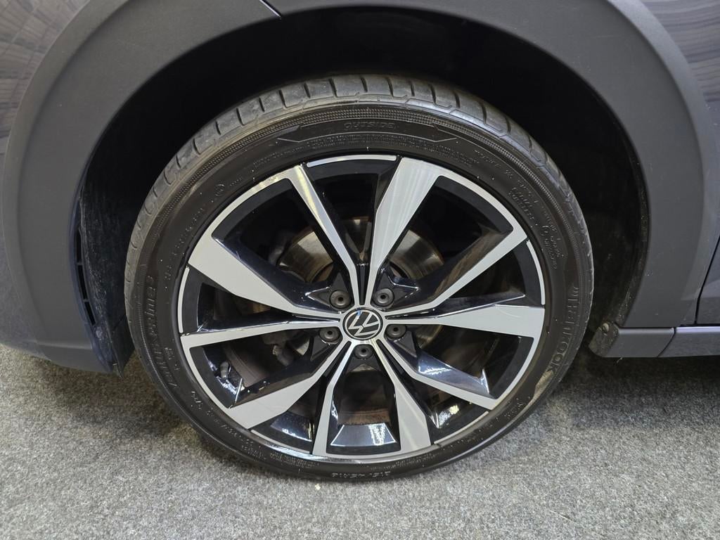Volkswagen Taigo 1.0 TSI R-Line Business Pano IQ Led Navi Cl, Auto's, 1160 kg, Gebruikt, Leder en Stof, Bedrijf