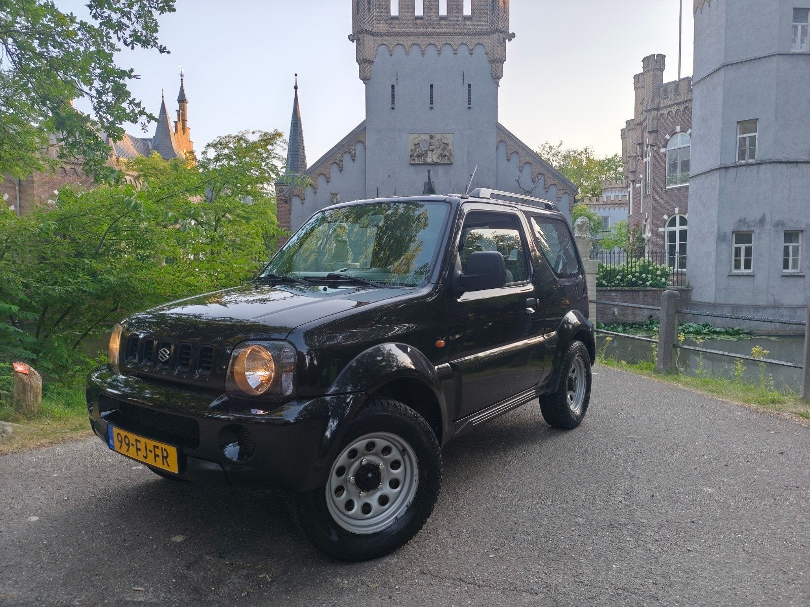 Suzuki Jimny 1.3 JX 4WD zwart / nw apk 8-2027 / nette auto!, Auto's, Suzuki, Metallic lak, Stof, 40 €/maand, 4 cilinders