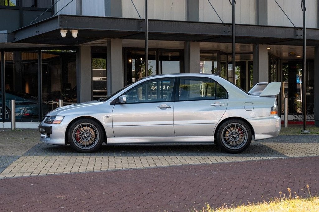 Mitsubishi Lancer Evolution IX MR (bj 2007), Auto's, Mitsubishi, Zwart, 4 cilinders, Origineel Nederlands, Bedrijf