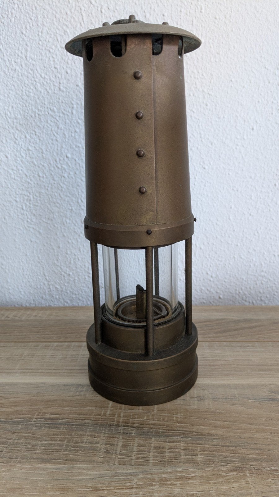 Mijnwerkerslamp., Ophalen