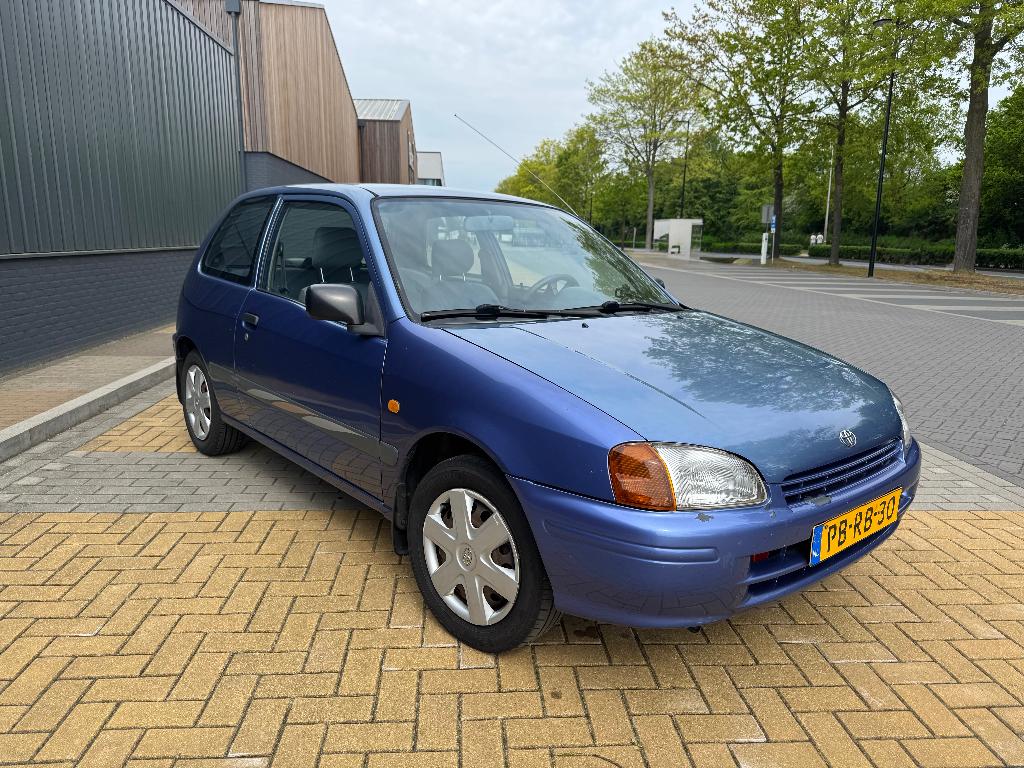 Toyota Starlet 1.3 16V 1996 Blauw, Auto's, Voorwielaandrijving, Stof, 4 cilinders, Starlet