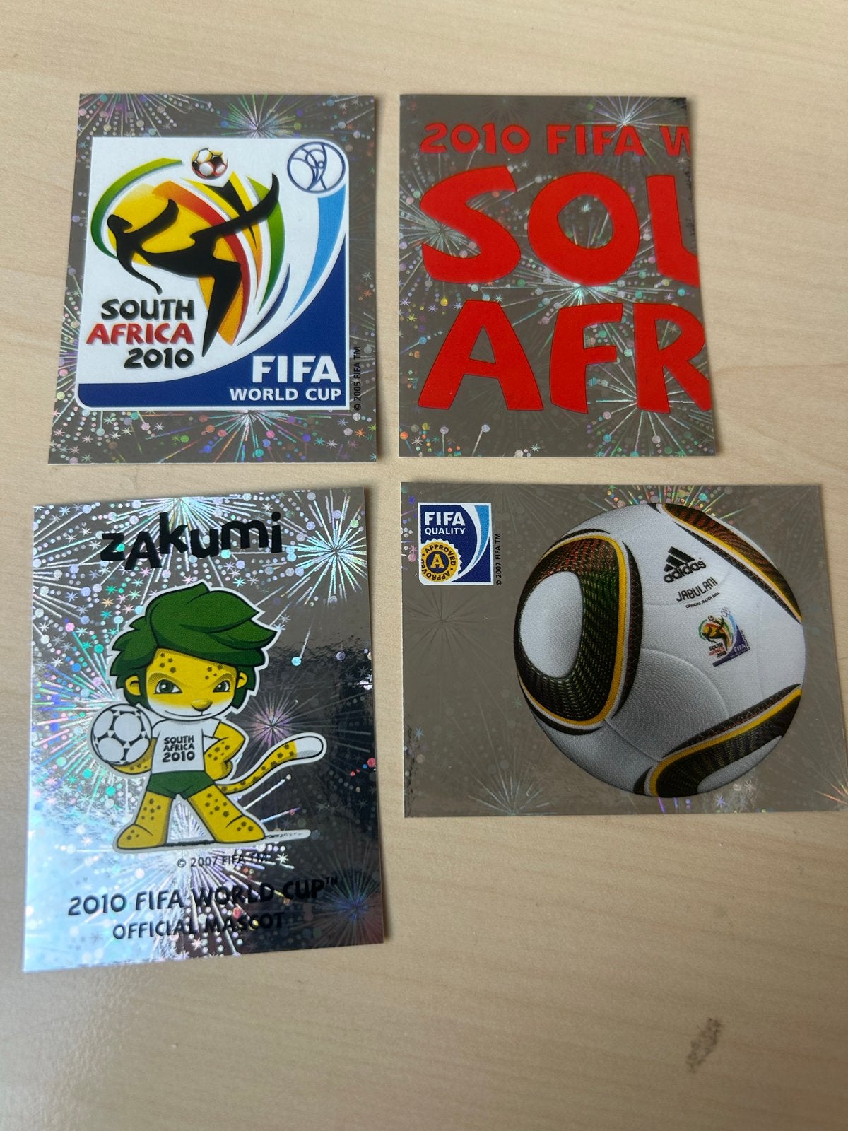 Panini WK 2010 Zuid-Afrika Stickers - Zakumi & Logo's, Ophalen of Verzenden, Zo goed als nieuw, Meerdere stickers