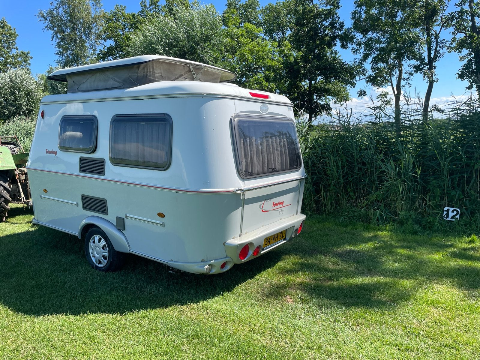 Compacte Eriba Touring 310 hefdak caravan, Treinzit, 750 - 1000 kg, Particulier, 4 tot 5 meter