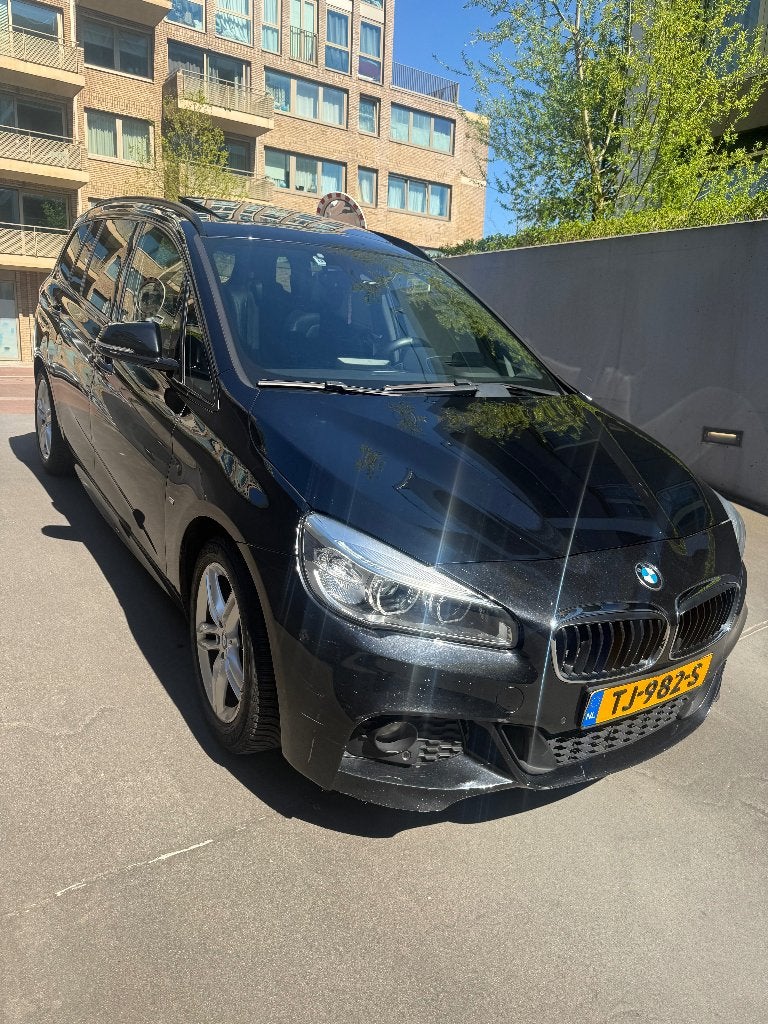 BMW 2-Serie Gran Tourer 220d 190pk Aut 7p. 2015 Zwart 190PK, Auto's, 1995 cc, 2-Serie Gran Tourer, 7 stoelen, Zwart