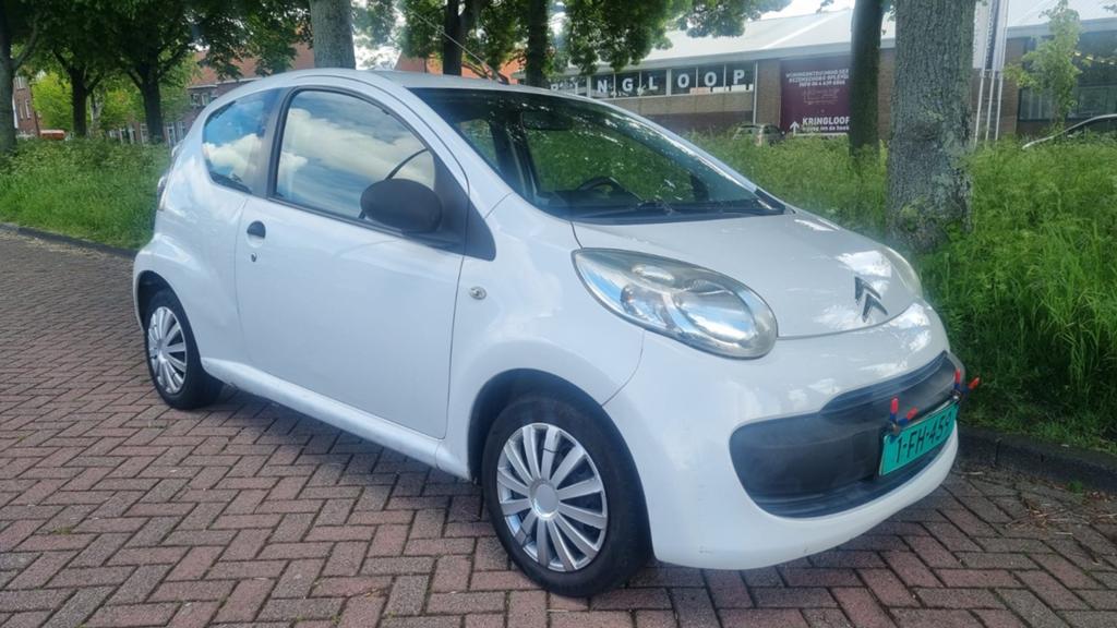 Goed rijdende Citroën C1 1.0 2007! APK verlopen. Laag km, Auto's, Peugeot, Voorwielaandrijving, Stof, Zwart, Wit