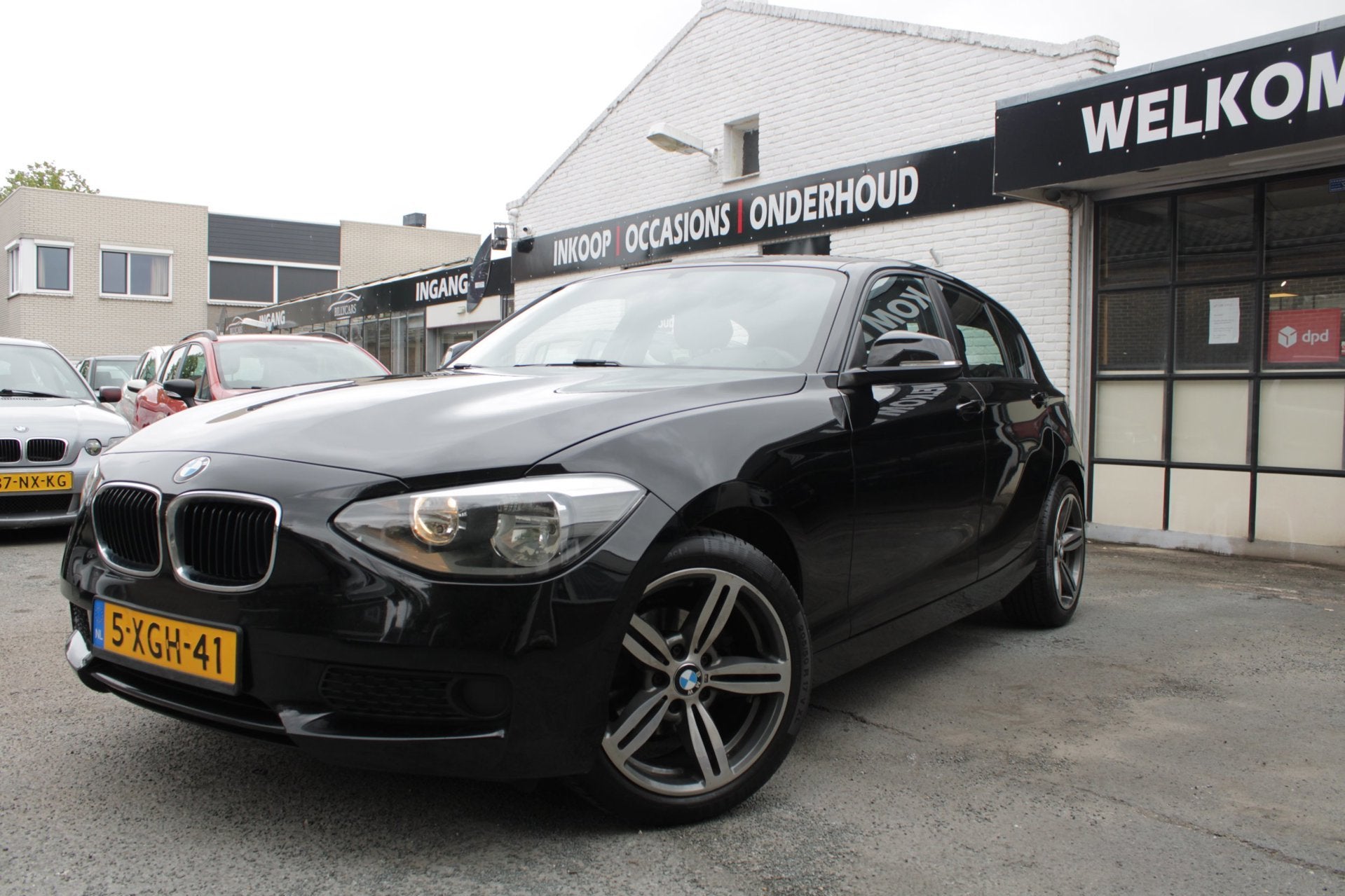 BMW 1-serie 114i EDE Business / Airco / Stoelverwarming / AP, Auto's, 1-Serie, Gebruikt, 4 cilinders, Zwart
