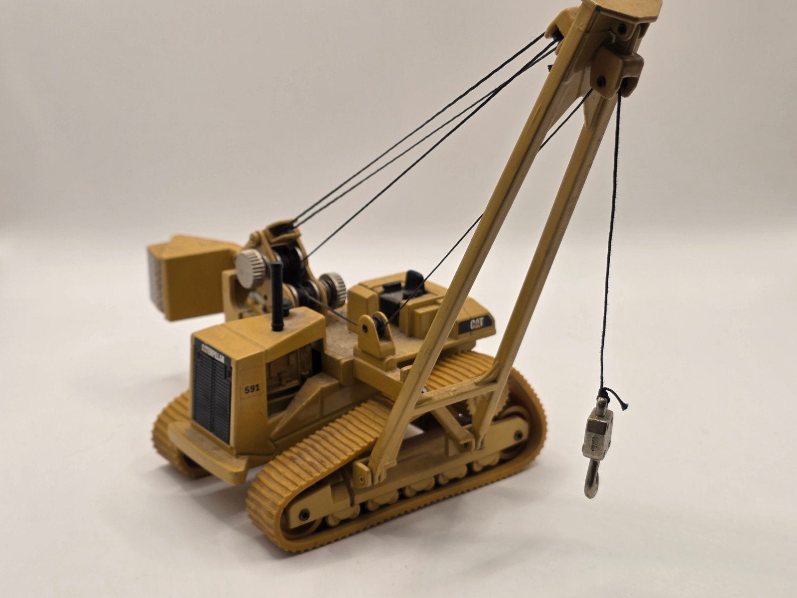 Caterpillar 591, Hobby en Vrije tijd, Modelauto's | 1:50, Zo goed als nieuw, Hijskraan, Tractor of Landbouw, Ophalen of Verzenden