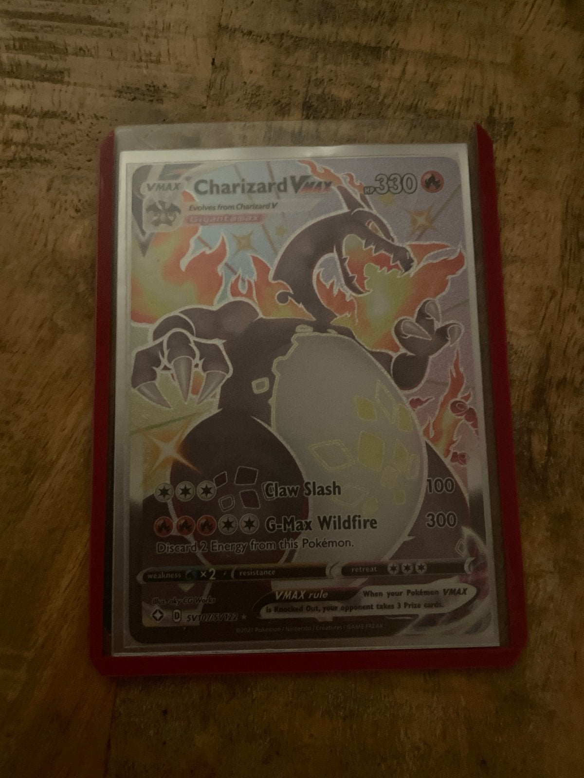 Charizard VMAX SV107/SV122 Shiny Vault Pokemon Kaart, Ophalen of Verzenden, Zo goed als nieuw, Losse kaart, Foil