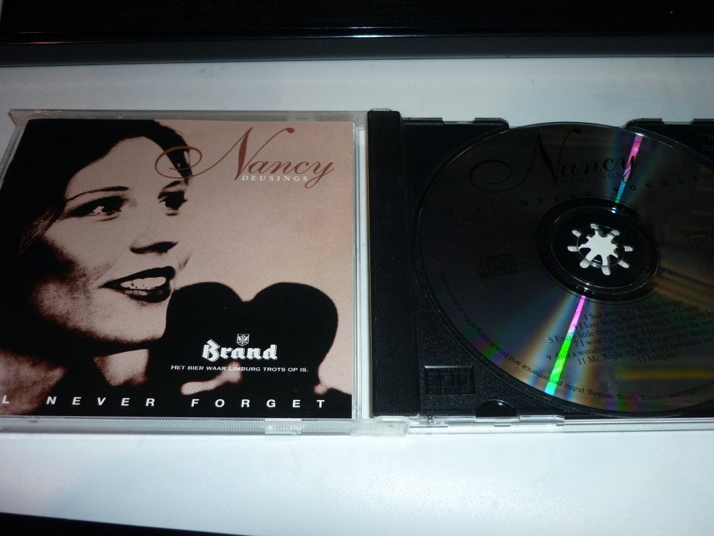 Nancy Deusing: I'll Never Forget CD, Inclusief doosje, Zo goed als nieuw, Album, Verzenden