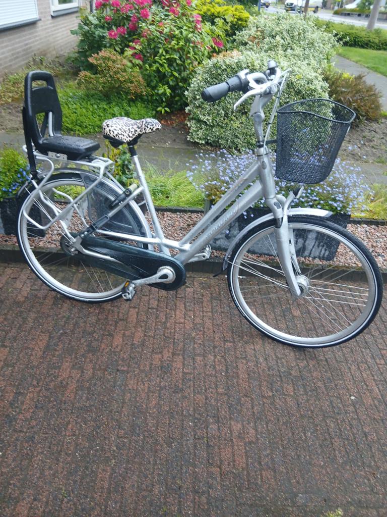 Sparta damesfiets met kinderzitje en mandje, Fietsen en Brommers, Fietsen | Dames | Damesfietsen, Sparta, Velgrem, Versnellingen