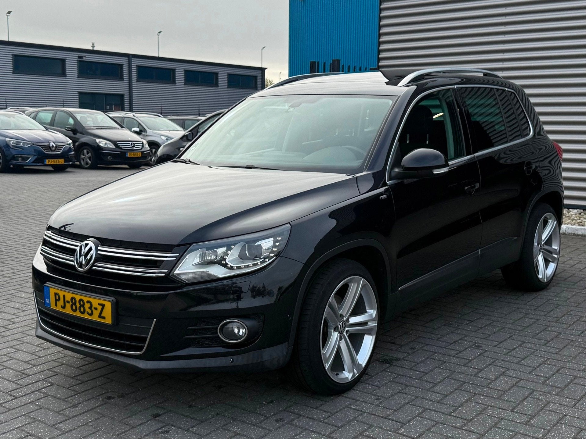Volkswagen Tiguan 1.4 TSI R-Line Edition, Auto's, Euro 5, 4 cilinders, Alcantara, 14 km/l