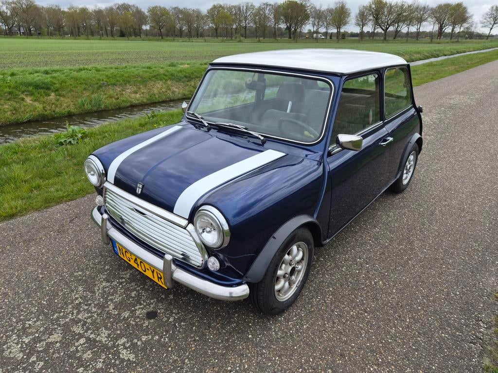 Classic Mini 1000 1.0 HLE 1985 Blauw, Auto's, Voorwielaandrijving, 4 cilinders, Blauw, Origineel Nederlands