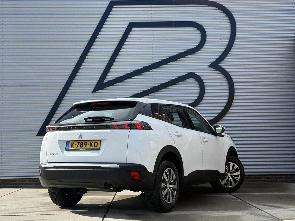 Peugeot 2008 1.2 PureTech Blue Lease Active 1e Eigenaar|Navi, Auto's, Peugeot, Parkeersensor, Stof, Gebruikt, Euro 6
