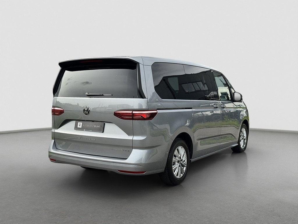 Volkswagen Multivan 1.5 eHybrid L2 Lang | Pano | Trekhaak |, Auto's, Volkswagen, Automaat, Stof, Zwart, 7 stoelen