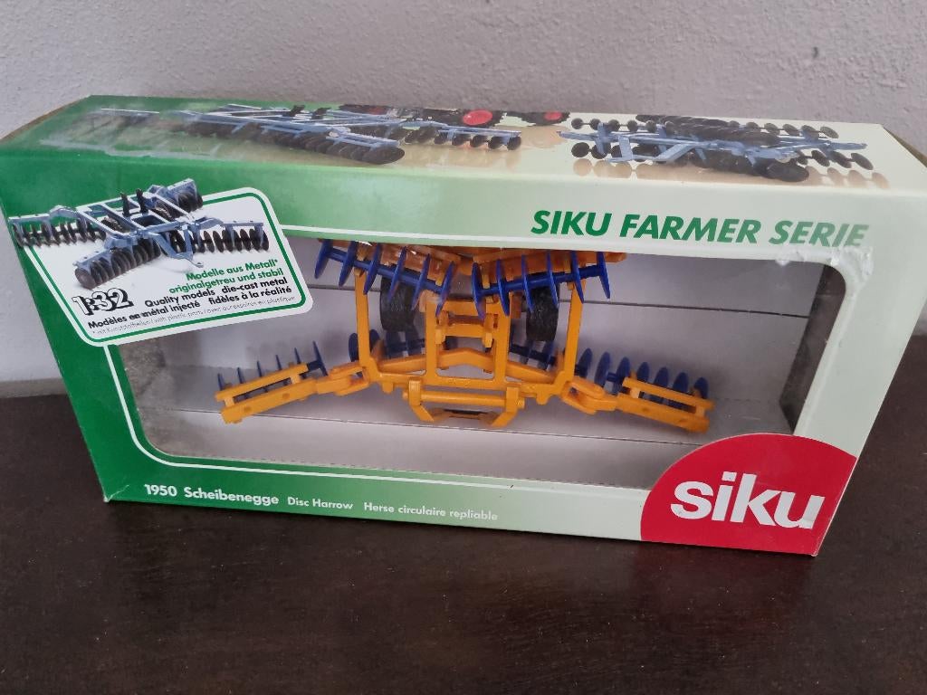 SIKU 1950 Scheibenegge, Hobby en Vrije tijd, Modelauto's | 1:32, Ophalen of Verzenden, Zo goed als nieuw, Tractor of Landbouw