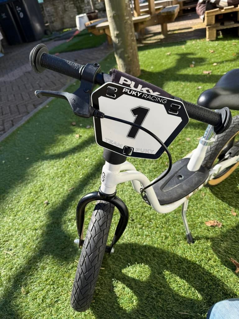 Stoere Puky loopfiets, Fietsen en Brommers, Fietsen | Jongens, Zo goed als nieuw, 14 inch of minder, Handrem, Trommelrem, Ophalen of Verzenden