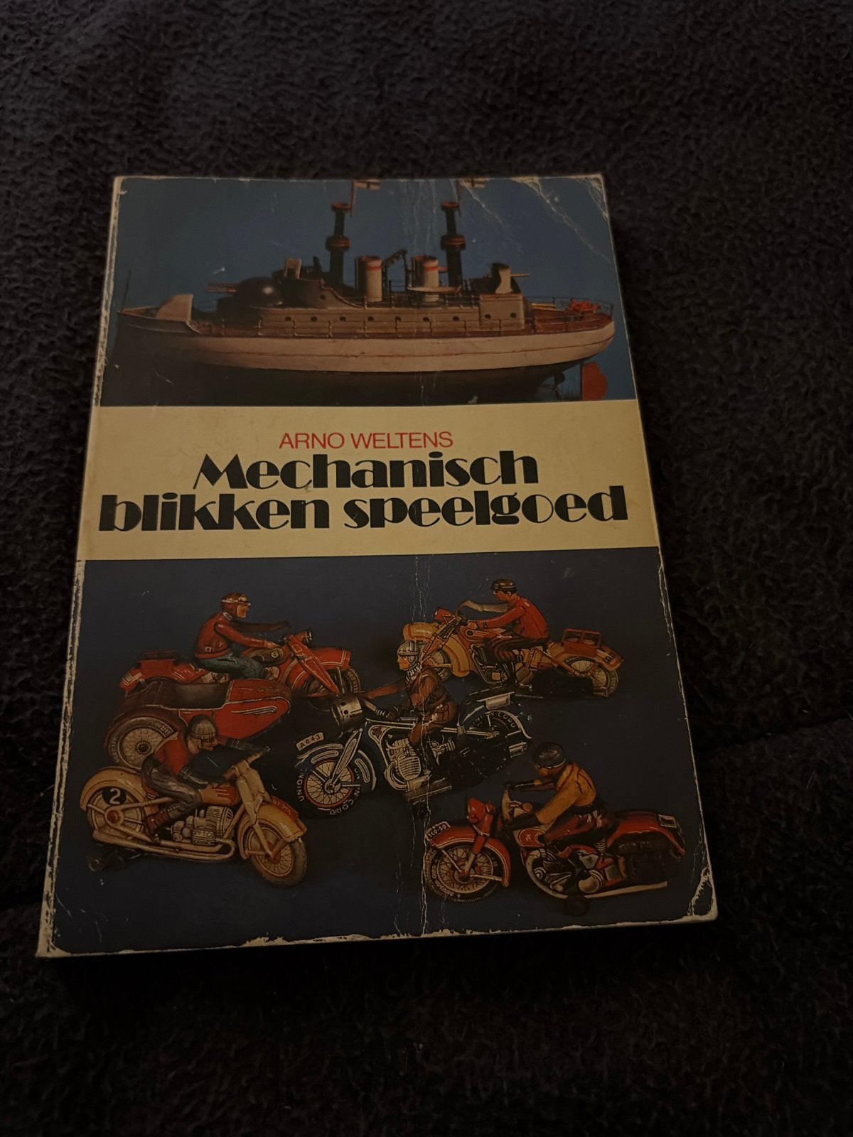 Mechanisch blikken speelgoed - Arno Weltens, Ophalen of Verzenden, Gelezen, Overige onderwerpen